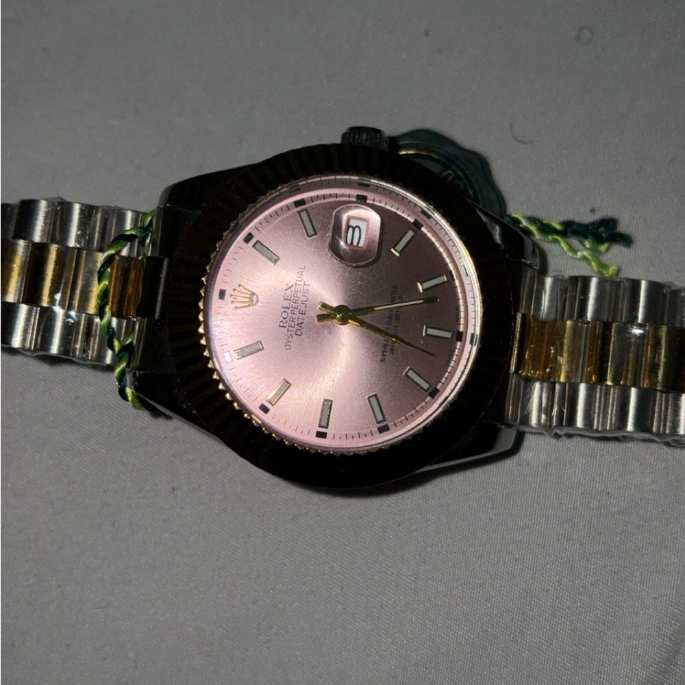 Rolex Silver and Pink Watch